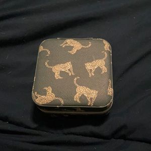 Mini jewelry box with compartments for rings, bracelets, necklaces